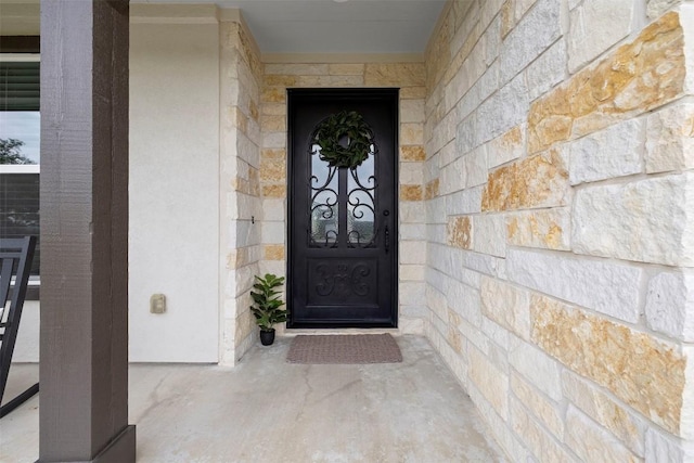 275 Axis Cir, Fredericksburg, TX 78624 - entrance to property featuring stone siding