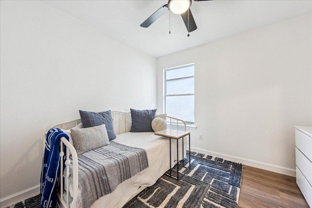 3405 Barksdale Dr, Austin, TX 78725 - bedroom featuring wood finished floors and ceiling fan