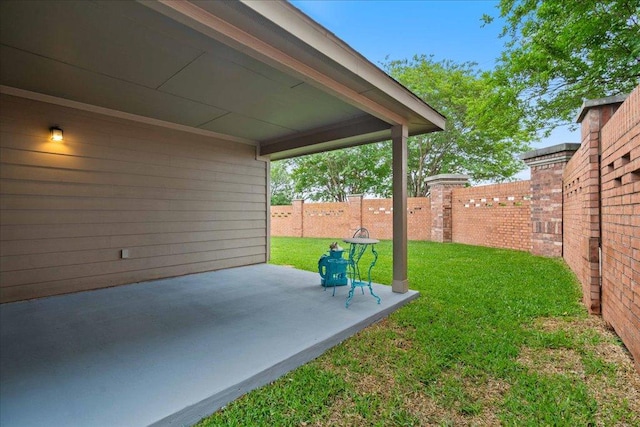 view of yard with a fenced backyard and a patio