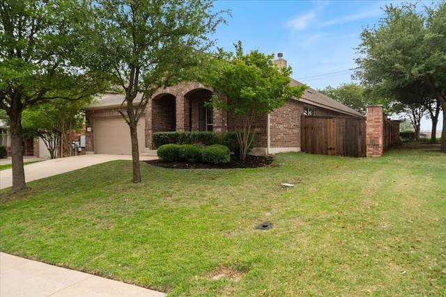 1929 Autumn Run Ln, Round Rock, TX 78665 - view of front facade featuring concrete driveway, an attached garage, brick siding, and a chimney