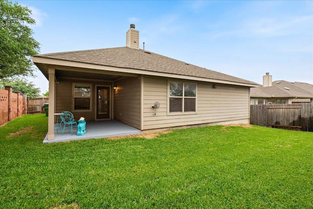 1929 Autumn Run Ln, Round Rock, TX 78665 - rear view of house with a patio area, a fenced backyard, and a chimney
