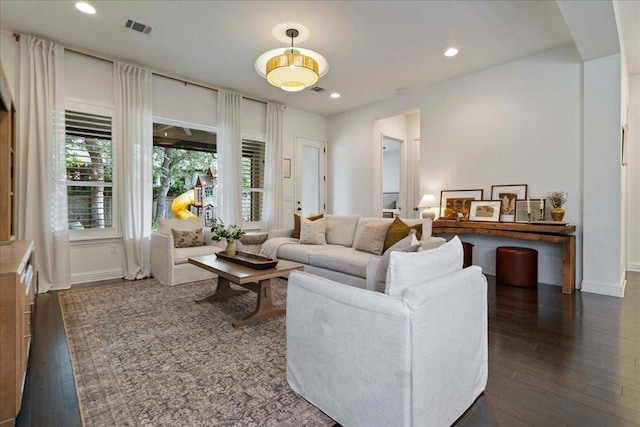 5305 Allamanda Dr, Austin, TX 78739 - living area with dark wood finished floors, baseboards, and recessed lighting