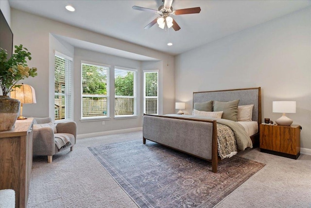 bedroom with carpet flooring, recessed lighting, baseboards, and a ceiling fan