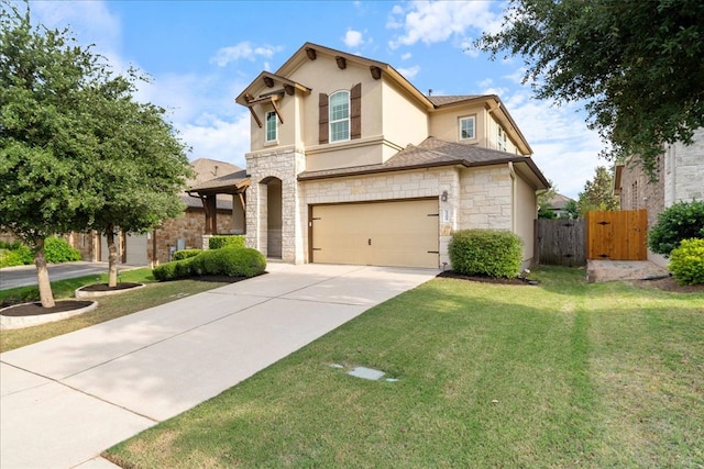 view of front of house with a front yard, an attached garage, driveway, and stone siding