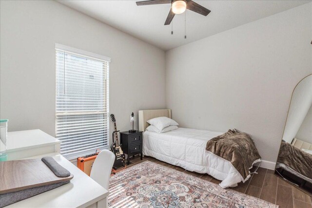 170 Alice Jane Ln, Buda, TX 78610 - bedroom featuring wood finished floors, a desk, and ceiling fan