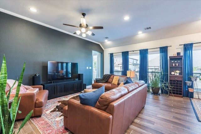 170 Alice Jane Ln, Buda, TX 78610 - living room featuring vaulted ceiling, wood finished floors, a ceiling fan, ornamental molding, and recessed lighting