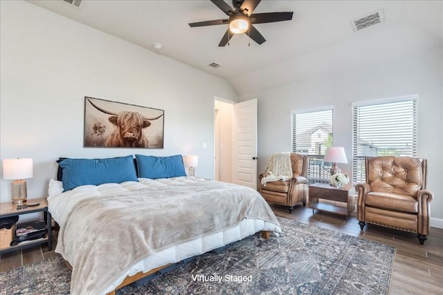170 Alice Jane Ln, Buda, TX 78610 - bedroom featuring wood finished floors, vaulted ceiling, and ceiling fan