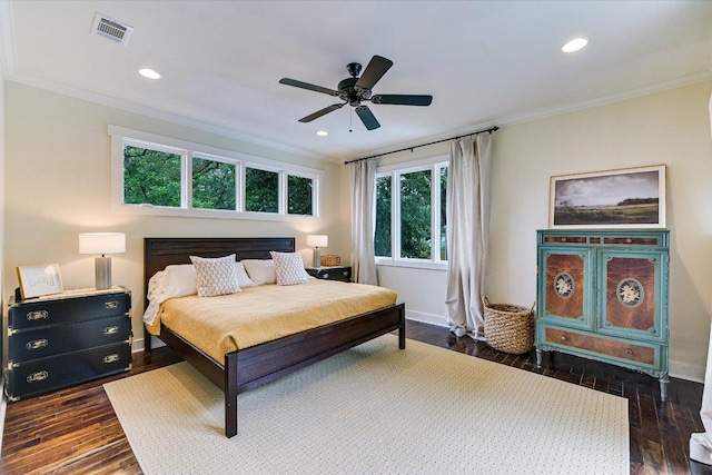 bedroom featuring recessed lighting, ornamental molding, dark wood-style floors, and visible vents