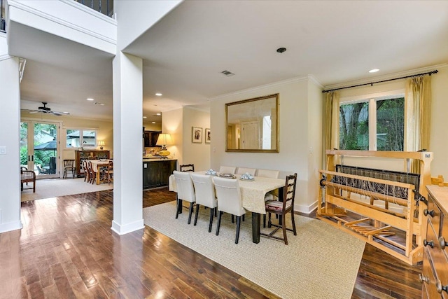 dining space with visible vents, crown molding, baseboards, recessed lighting, and dark wood-type flooring