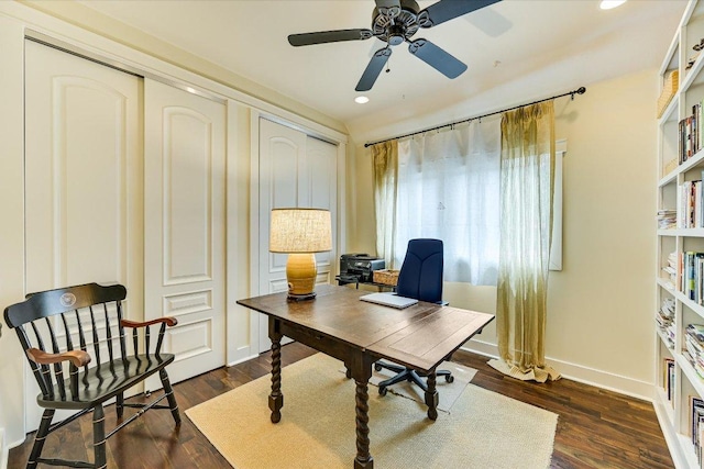 office space with dark wood-style flooring, recessed lighting, a ceiling fan, and baseboards