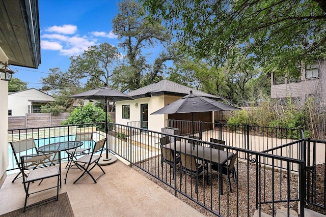 view of patio with a fenced in pool and a fenced backyard