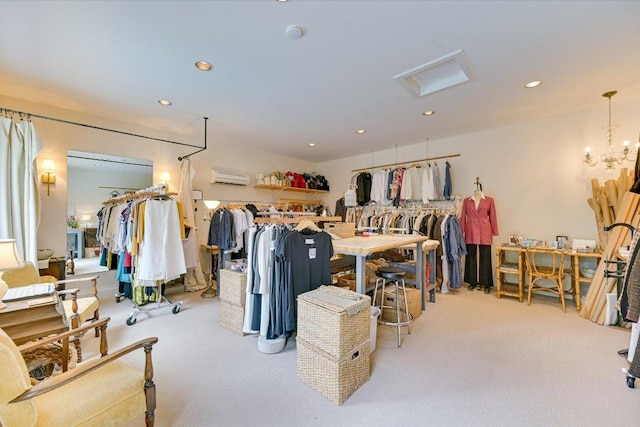 miscellaneous room featuring carpet floors, recessed lighting, a wall mounted AC, and attic access