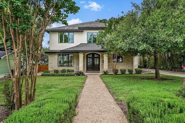 2401 Westover Rd, Austin, TX 78703 - view of front of property featuring stone siding, french doors, stucco siding, and a shingled roof