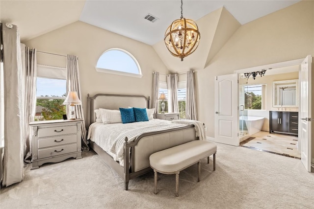 bedroom with carpet flooring, an inviting chandelier, ensuite bathroom, vaulted ceiling, and visible vents