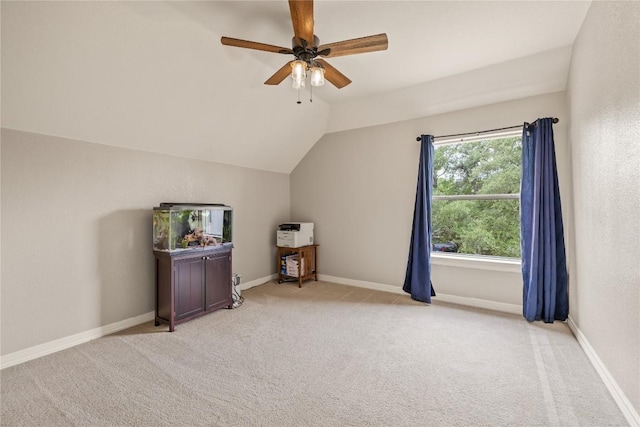 bonus room with ceiling fan, vaulted ceiling, light carpet, and baseboards