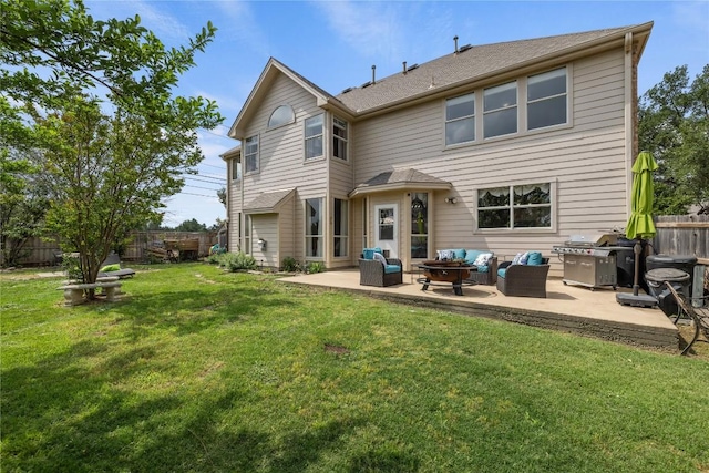 rear view of property featuring a lawn, a patio, a fenced backyard, and an outdoor living space with a fire pit