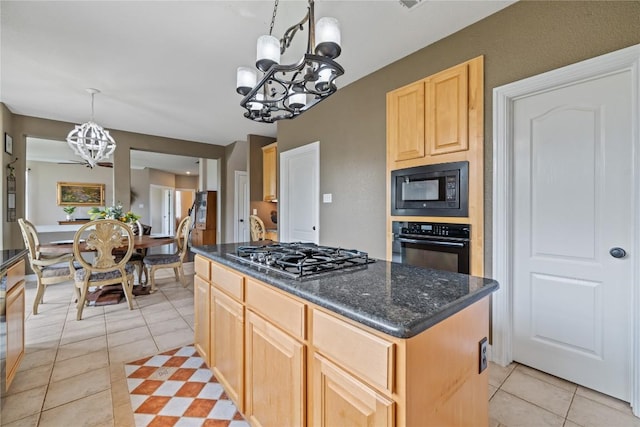 kitchen featuring black appliances, light tile patterned floors, a notable chandelier, and light brown cabinets