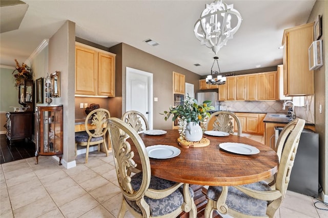 100 S Ridge Cir, Georgetown, TX 78628 - dining room with a chandelier, light tile patterned floors, and baseboards