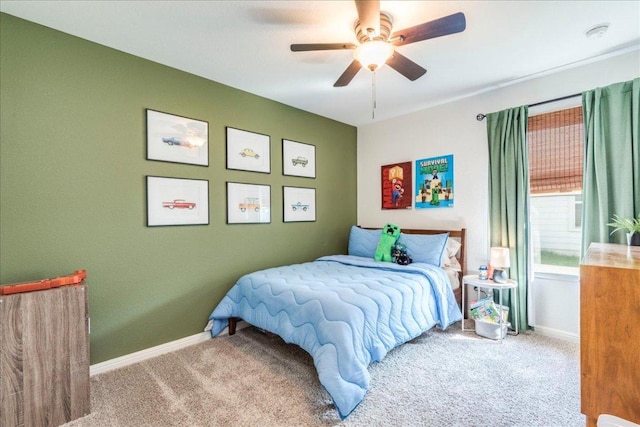 268 Forrest Moon Ln, Kyle, TX 78640 - carpeted bedroom featuring baseboards and ceiling fan
