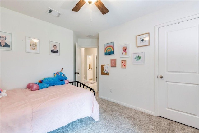 268 Forrest Moon Ln, Kyle, TX 78640 - bedroom with light carpet, a ceiling fan, and baseboards