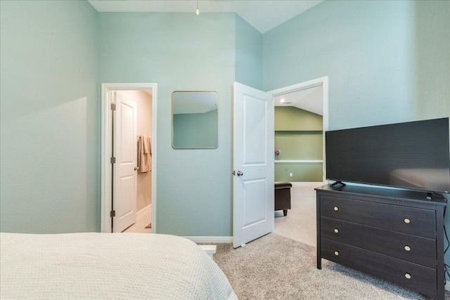 268 Forrest Moon Ln, Kyle, TX 78640 - bedroom with carpet floors, baseboards, and ensuite bath