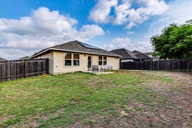 268 Forrest Moon Ln, Kyle, TX 78640 - rear view of property with solar panels and a patio area