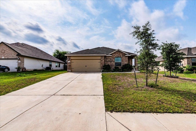 ranch-style house with brick siding, a garage, a front lawn, and driveway