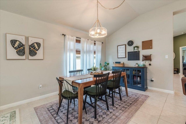 268 Forrest Moon Ln, Kyle, TX 78640 - dining space featuring a chandelier, vaulted ceiling, baseboards, and light tile patterned floors