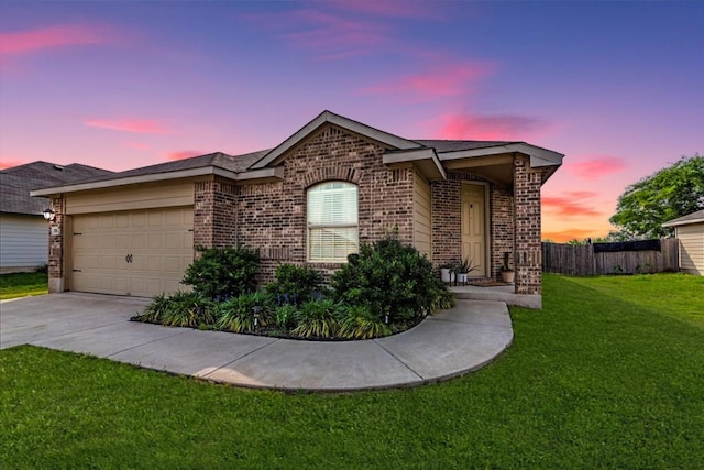 268 Forrest Moon Ln, Kyle, TX 78640 - single story home featuring brick siding, an attached garage, and driveway