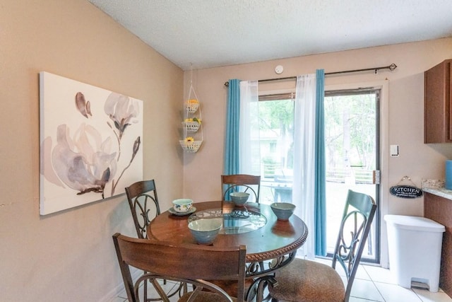 dining room with light tile patterned floors