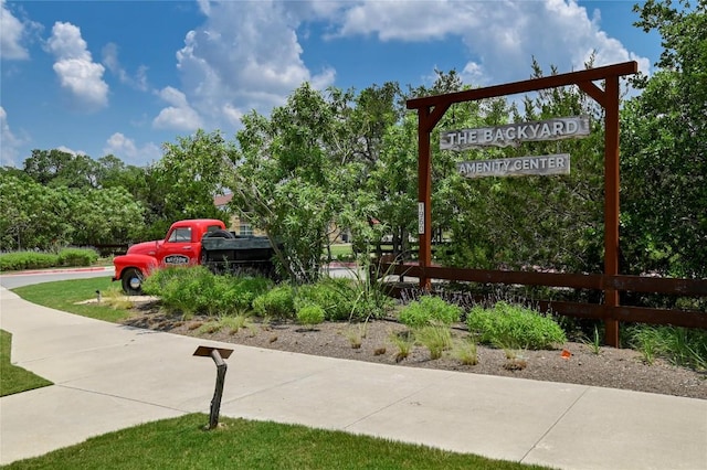 view of property's community with fence