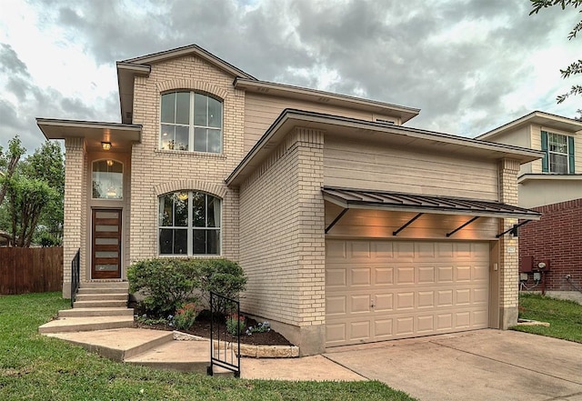 traditional-style home featuring fence, driveway, and brick siding