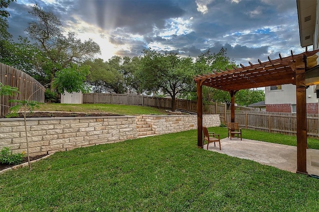 view of yard with a fenced backyard, a pergola, and a patio area
