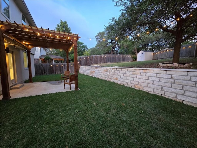 view of yard featuring a pergola, a shed, a fenced backyard, a patio area, and an outdoor structure