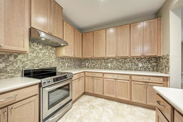 kitchen featuring stainless steel electric stove, light brown cabinetry, under cabinet range hood, and light countertops