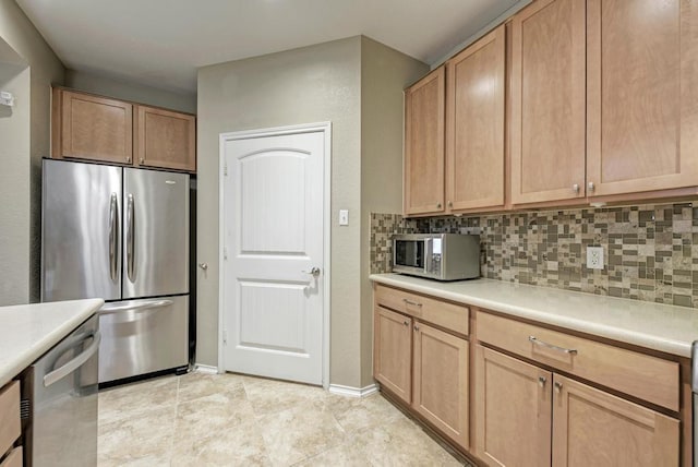 2119 Howell Mountain Dr, Cedar Park, TX 78613 - kitchen featuring appliances with stainless steel finishes, light countertops, and tasteful backsplash