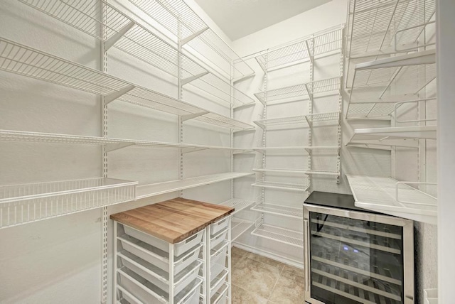 storage area featuring wine cooler