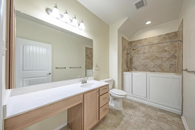 full bathroom with toilet, visible vents, bathing tub / shower combination, and vanity