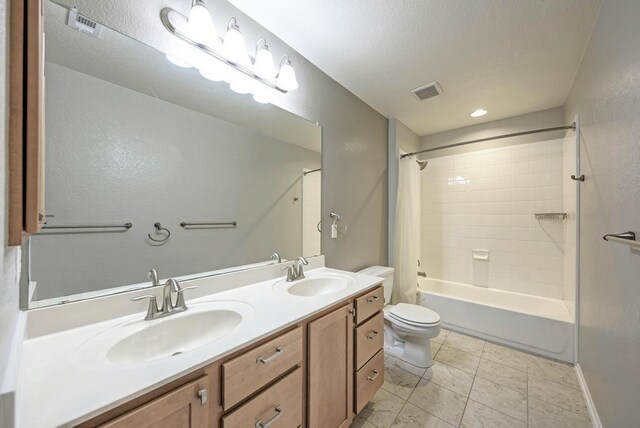 2119 Howell Mountain Dr, Cedar Park, TX 78613 - full bathroom featuring shower / bath combo with shower curtain and double vanity