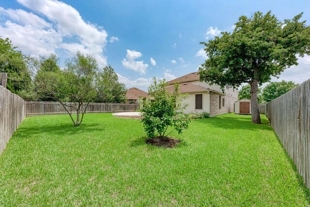 2119 Howell Mountain Dr, Cedar Park, TX 78613 - fenced backyard with a storage unit