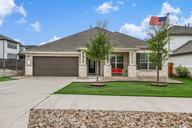 view of front of property featuring a garage, fence, concrete driveway, and a front lawn