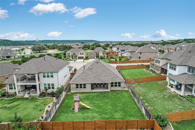 drone / aerial view with a residential view
