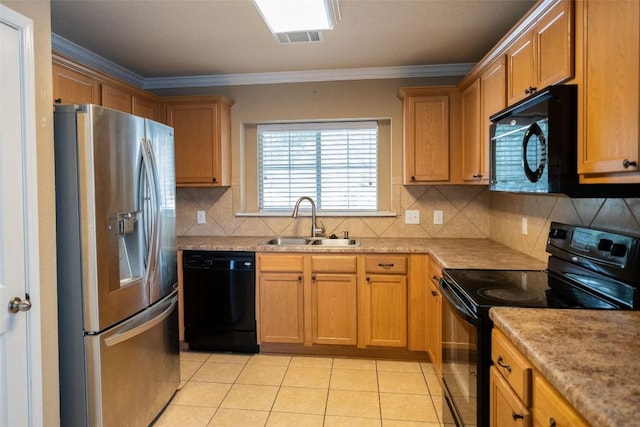 kitchen featuring visible vents, decorative backsplash, light tile patterned flooring, a sink, and black appliances