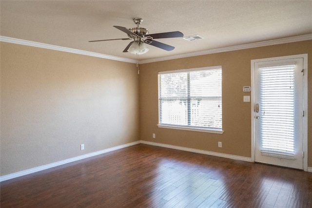 unfurnished room featuring visible vents, dark wood finished floors, ceiling fan, and baseboards