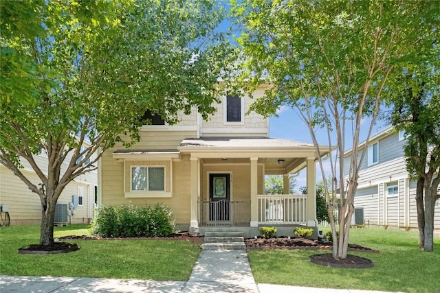 view of front of property with covered porch and a front yard