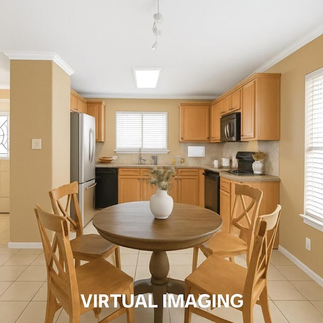636 Gabriel Mills Dr, Round Rock, TX 78664 - kitchen featuring a sink, black appliances, light tile patterned flooring, and a wealth of natural light