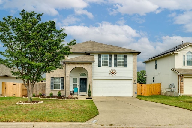 127 Saint Marys Dr, Hutto, TX 78634 - traditional-style home with fence, an attached garage, a shingled roof, a front yard, and concrete driveway