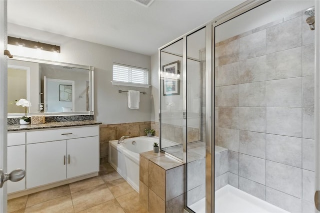bathroom with vanity, tile patterned floors, a stall shower, and a bath