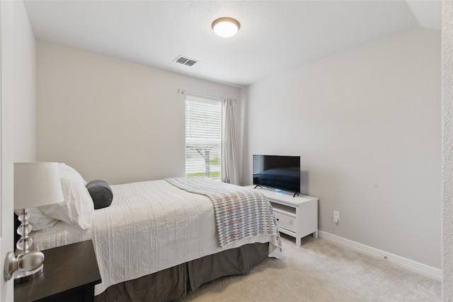 bedroom featuring carpet floors, baseboards, and visible vents