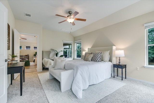 bedroom with carpet flooring, a ceiling fan, baseboards, and visible vents